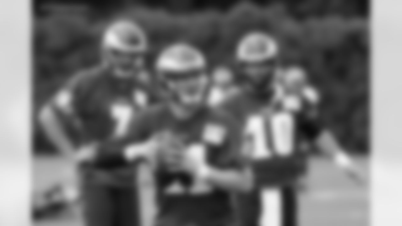 Philadelphia Eagles quarterbacks Sam Bradford (7), Chase Daniel (10), and Carson Wentz (11) during practice at the team's NFL football training facility in Philadelphia, Tuesday, June 7, 2016. (AP Photo/Matt Rourke)
