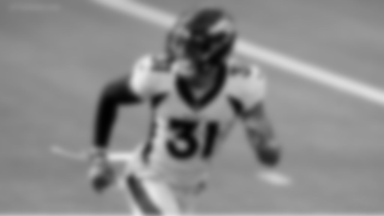 Denver Broncos free safety Justin Simmons (31) warms up before an NFL football game against the Los Angeles Chargers Sunday, Dec. 27, 2020, in Inglewood, Calif. (AP Photo/Ashley Landis)