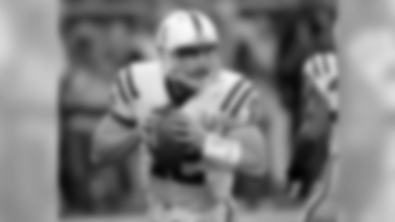 Indianapolis Colts' Andrew Luck looks to throw against the Houston Texans during the first quarter of an NFL football game Sunday, Nov. 3, 2013, in Houston. (AP Photo/David J. Phillip)