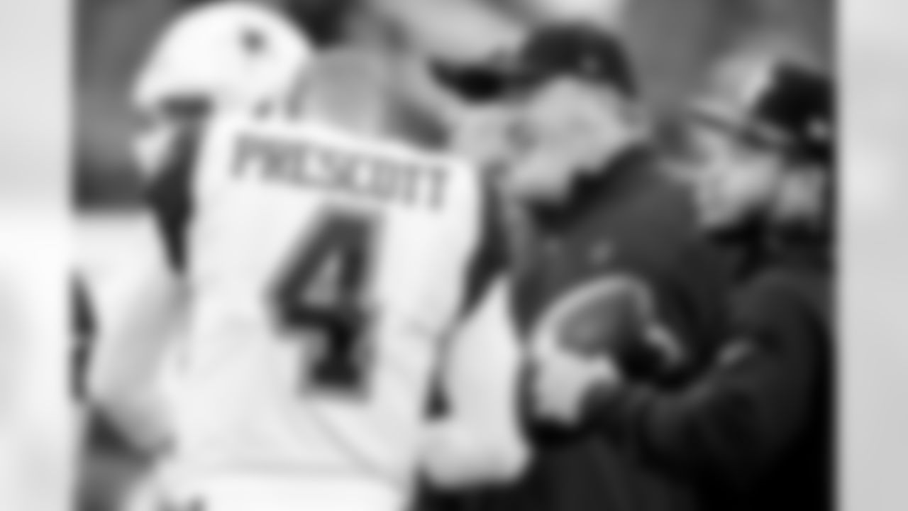 Dallas Cowboys quarterback Dak Prescott (4) talks to head coach Mike McCarthy during warm ups before an NFL football game against the Los Angeles Chargers Monday, Oct. 16, 2023, in Inglewood, Calif. (AP Photo/Ashley Landis)