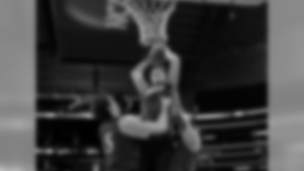 Kansas' Tyler Self dunks with the help of Christophe Varidel (5) and Jamari Traylor