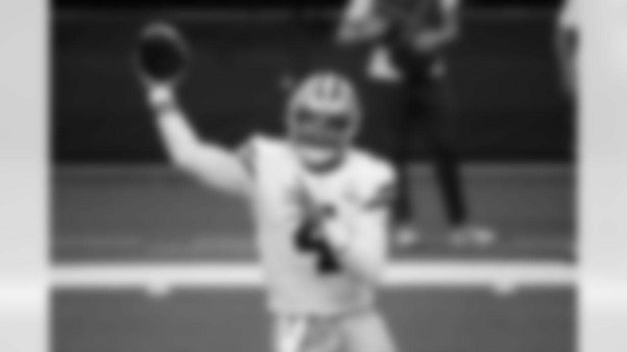 Dallas Cowboys quarterback Dak Prescott throws a pass in the first half of an NFL football game against the New York Giants in Arlington, Texas, Sunday, Oct. 11, 2020. (AP Photo/Michael Ainsworth)