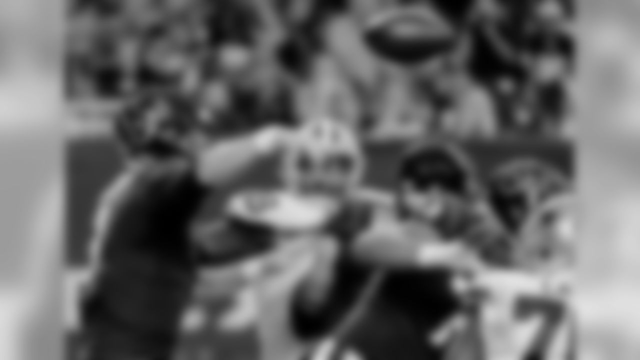 Houston Texans quarterback Brandon Weeden (3) is pressured by Dallas Cowboys defensive tackle Daniel Ross (68) as he throws during the first half of a preseason NFL football game Thursday, Aug. 30, 2018, in Houston. (AP Photo/George Bridges)