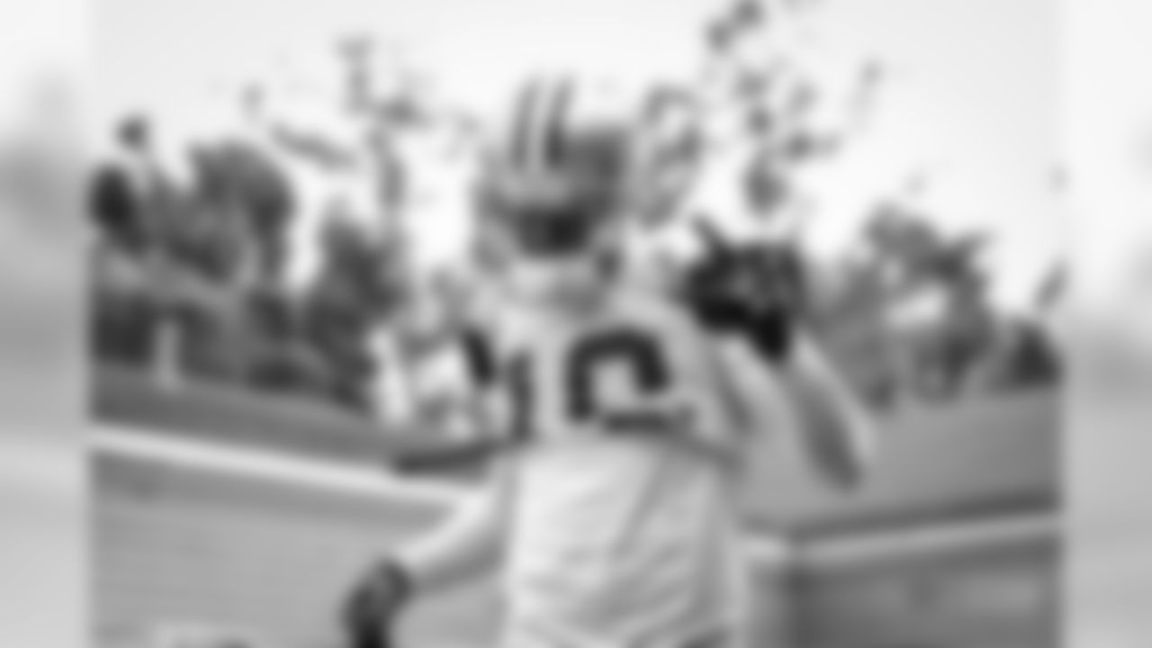 Views of the Dallas Cowboys as they take the field for the first time in pads for afternoon training camp practice at the River Ridge Complex in Oxnard, CA