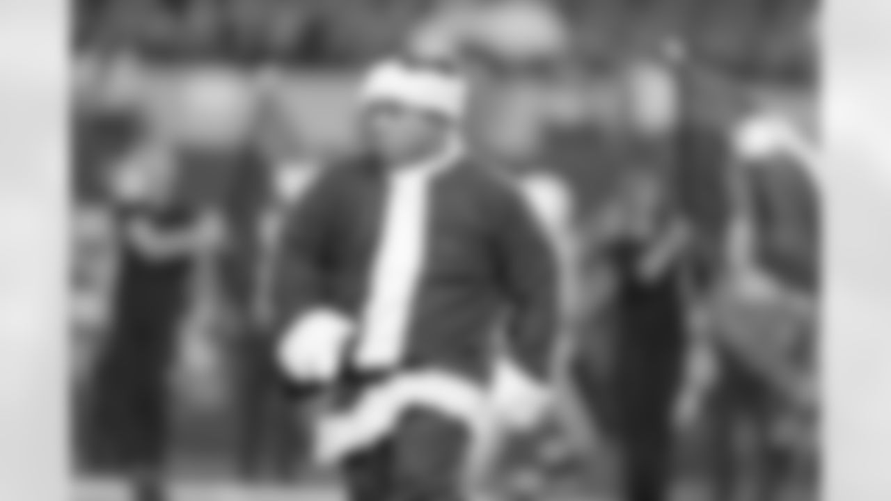 21 December 2014: Santas during cheerleaders Christmas halftime show
of the Dallas Cowboys during the Cowboys 42-7 win over the Indianapolis Colts at AT&T Stadium in Arlington, Texas. Photo by James D. Smith/Dallas Cowboys