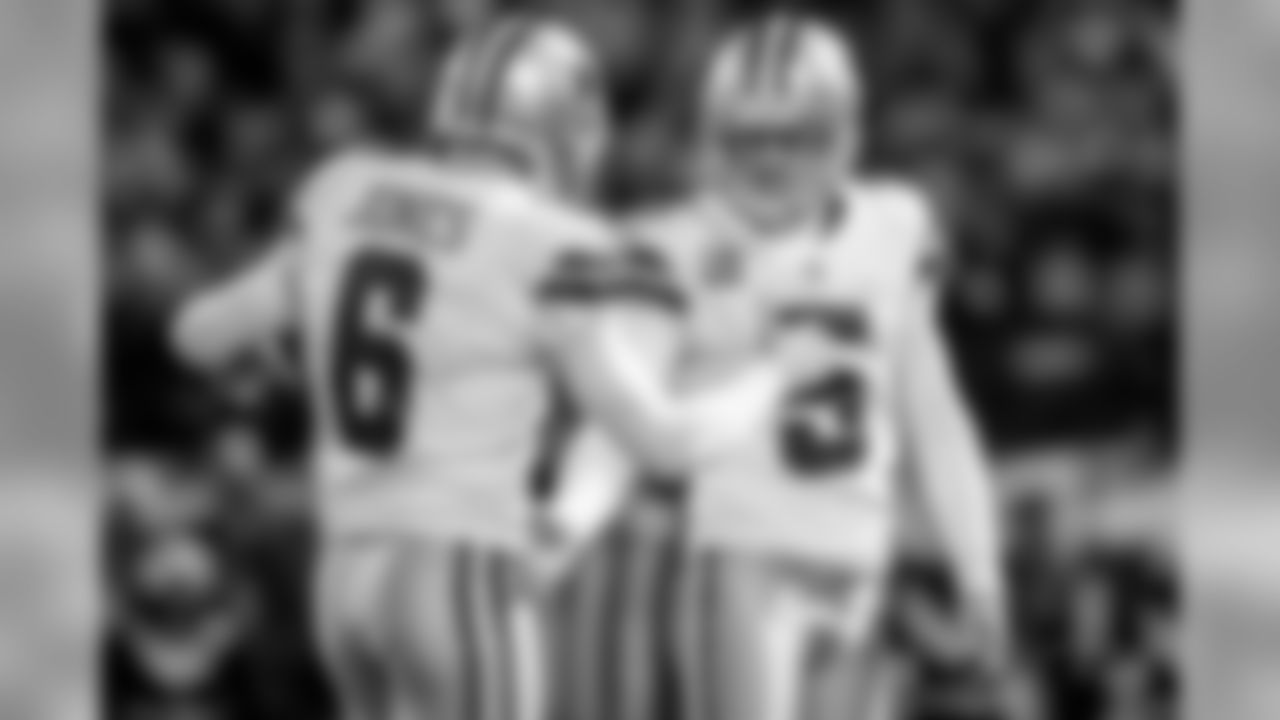 Dallas Cowboys place kicker Dan Bailey (5) celebrates with punter Chris Jones (6) during a week 15 NFL football game against the Oakland Raiders on Sunday, Dec. 17, 2017 in Oakland, Calif. Dallas won 20-17. (Aaron M. Sprecher via AP)