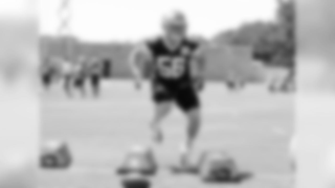 Caleb McSurdy works through linebacker drills.