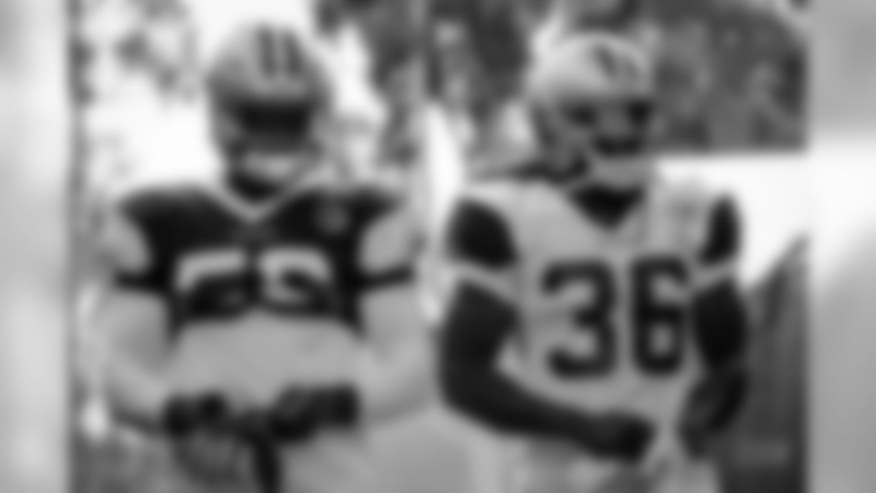 Views of the Dallas Cowboys as they take the field for the first time in pads for afternoon training camp practice at the River Ridge Complex in Oxnard, CA