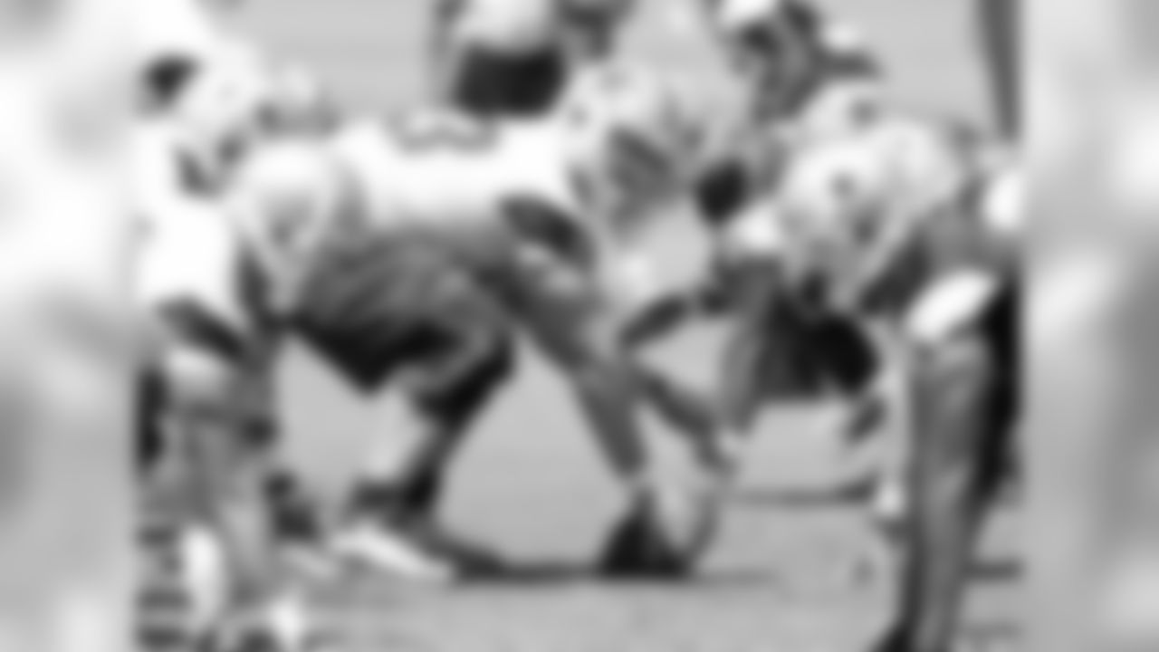 Ryan Cook takes some snaps at center.