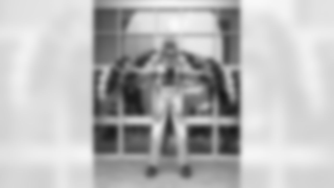 rowdy_photo_-_stilts_with_arms_open_0.jpg