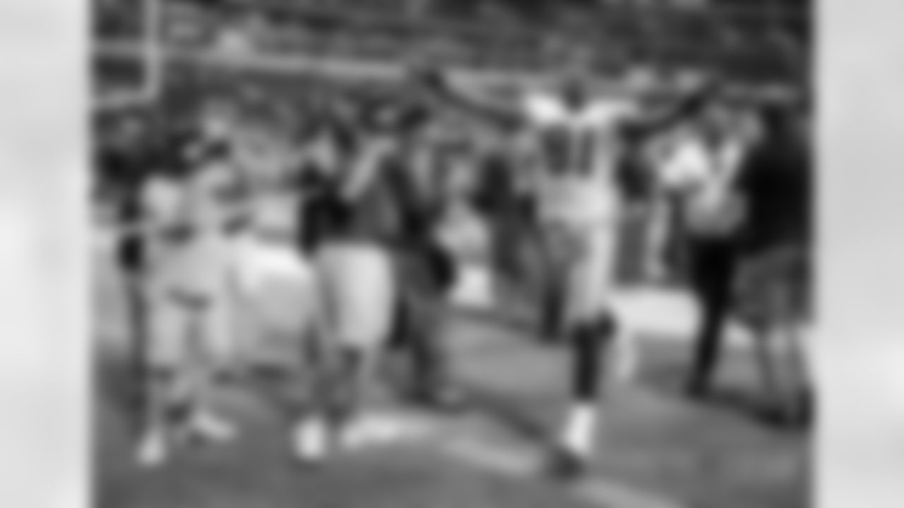 Wide receiver Terrell Owens #81 of the Dallas Cowboys raises his arms in celebration as he runs off the field after the game against the Philadelphia Eagles at Texas Stadium on September 15, 2008 in Irving, Texas. The Cowboys defeated the Eagles 41-37. (AP Photo/Paul Spinelli)