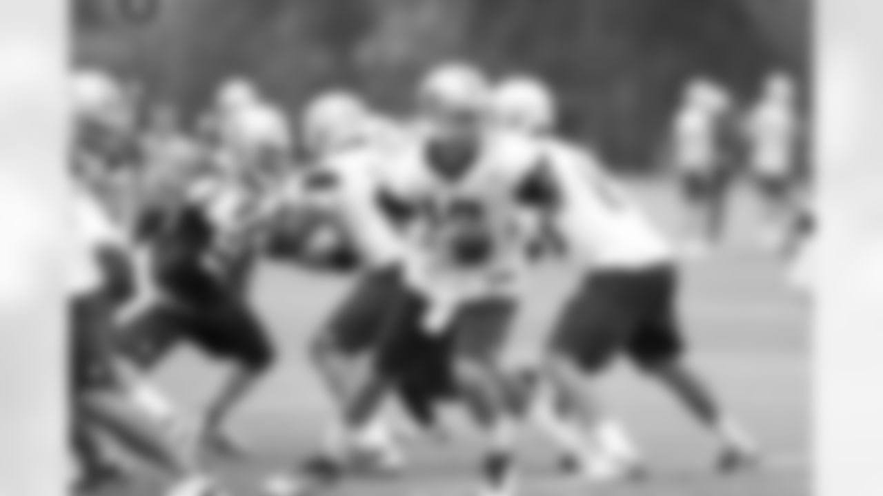 QB Kyle Orton looks to pass the ball off during team drills.