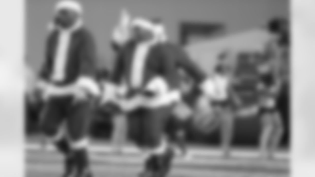 21 December 2014: Santas during cheerleaders Christmas halftime show
of the Dallas Cowboys during the Cowboys 42-7 win over the Indianapolis Colts at AT&T Stadium in Arlington, Texas. Photo by James D. Smith/Dallas Cowboys