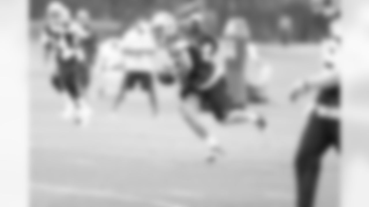 Matt Johnson runs with the ball during OTAs.