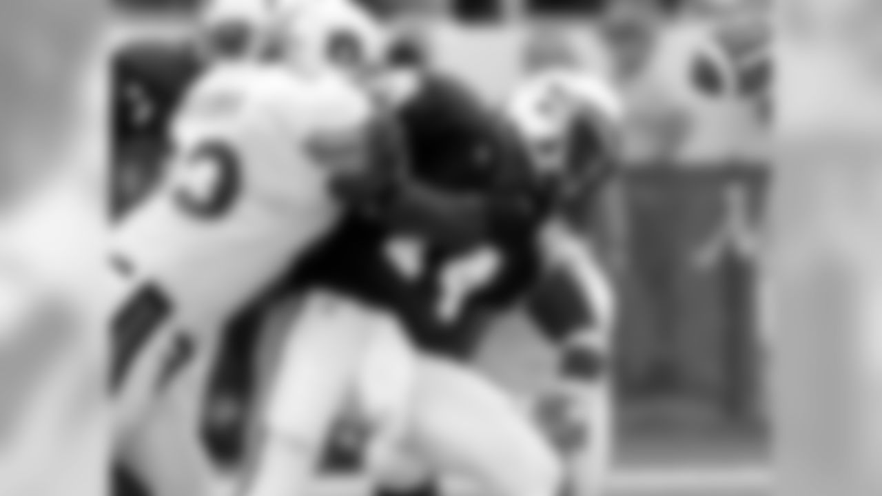 2004 - Ratliff forces a fumble while playing for Auburn in 2004. Ratliff was drafted in the seventh-round (224th overall) by Dallas in the 2005 draft.