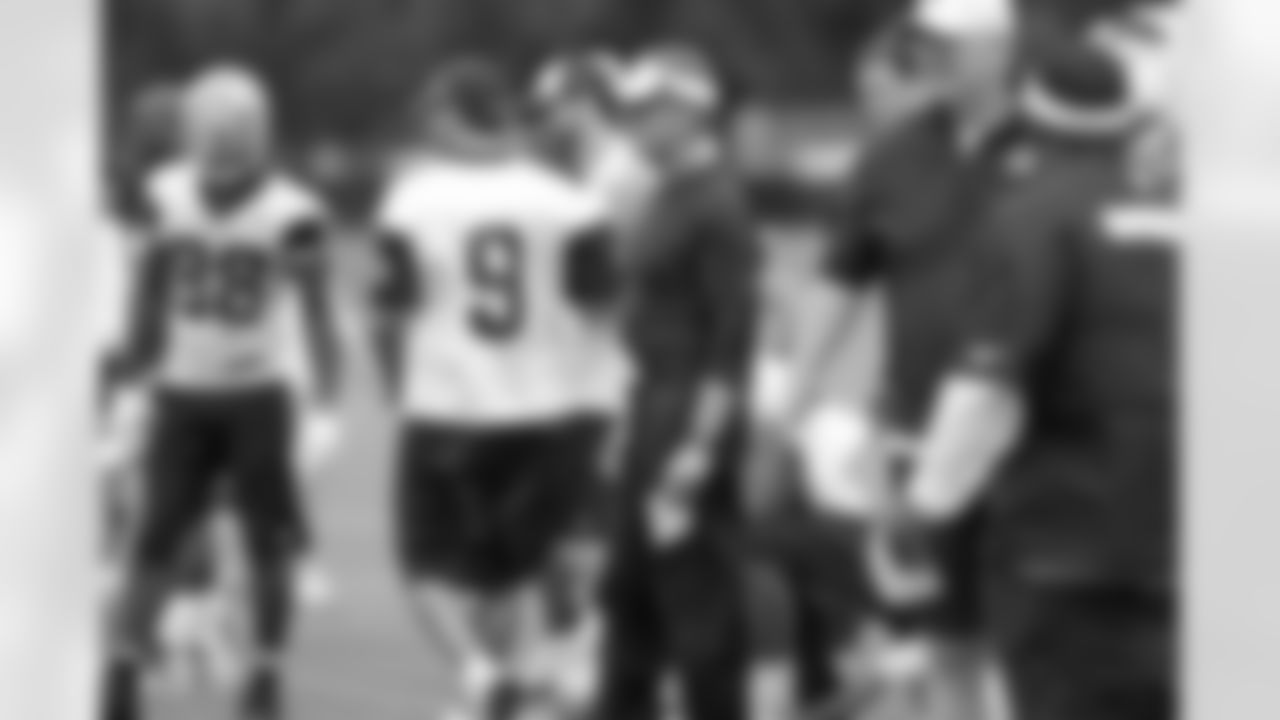 Head coach Jason Garrett watches OTAs.