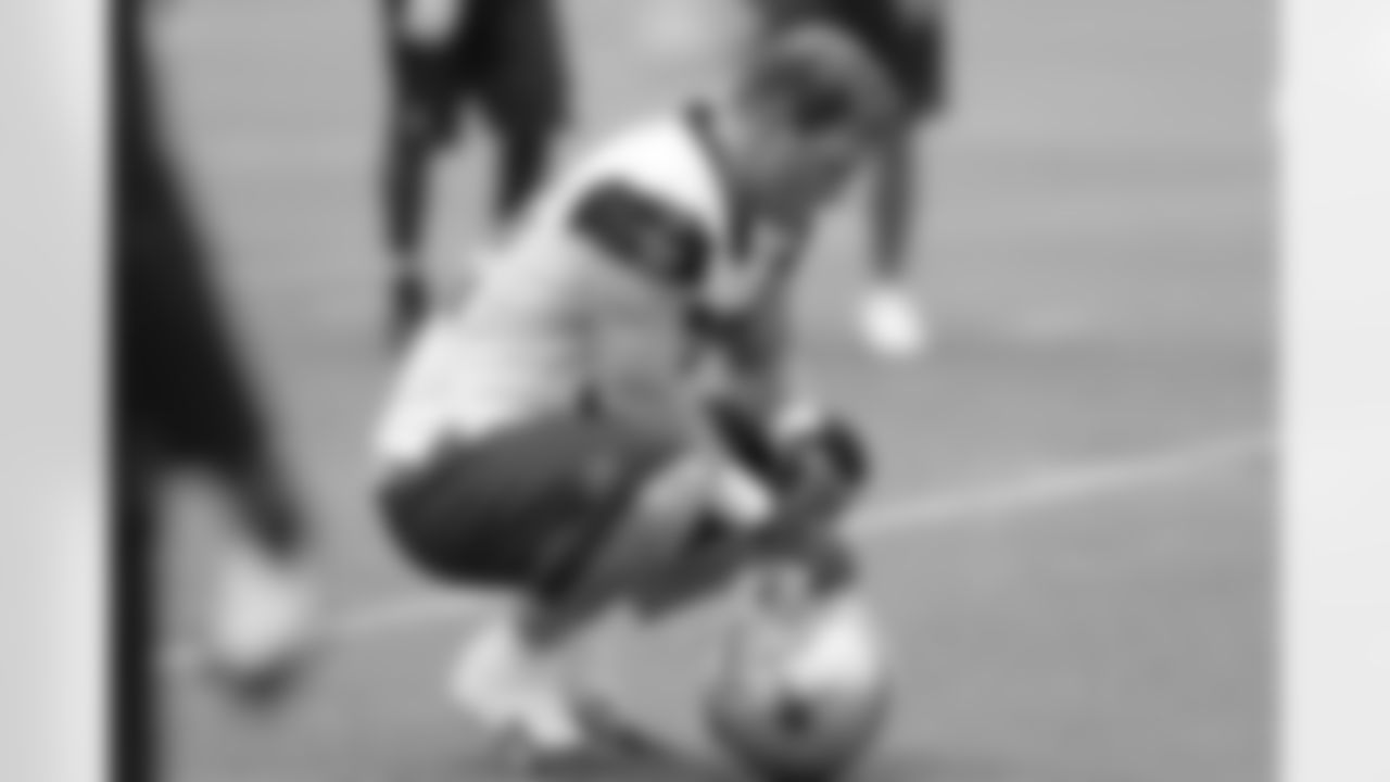 Jason Witten rests on the sideline during practice.