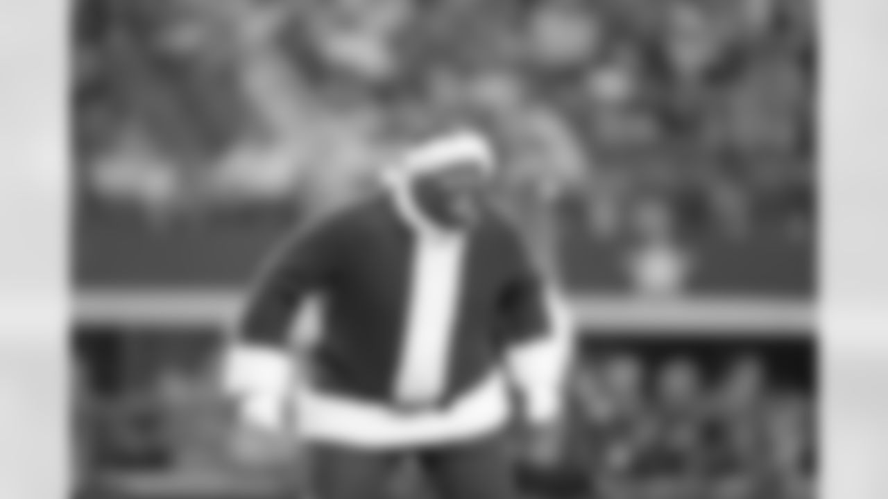 21 December 2014: Santas during cheerleaders Christmas halftime show
of the Dallas Cowboys during the Cowboys 42-7 win over the Indianapolis Colts at AT&T Stadium in Arlington, Texas. Photo by James D. Smith/Dallas Cowboys