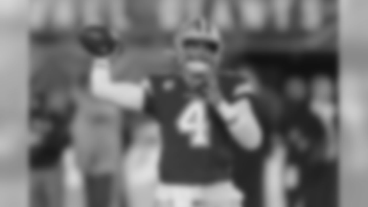 Dallas Cowboys quarterback Dak Prescott (4) warms up before an NFL football game against the New York Giants, Monday, Nov. 4, 2019, in East Rutherford, N.J. (AP Photo/Bill Kostroun)