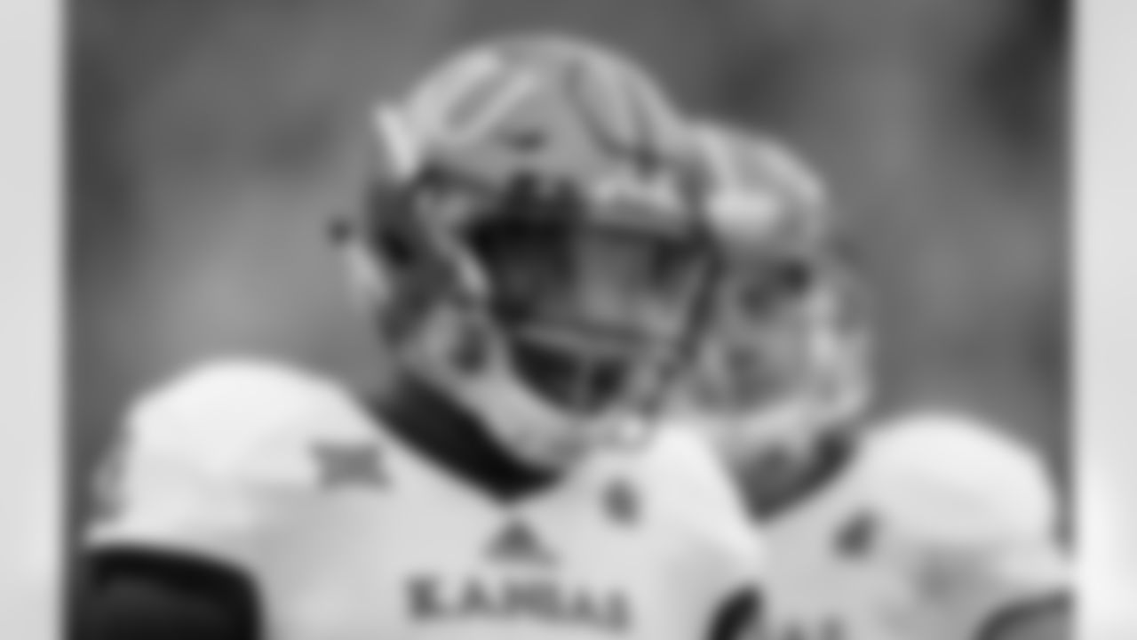 Kansas defensive end Dorance Armstrong Jr. stands on the sidelines during the first half of an NCAA college football game against Iowa State, Saturday, Oct. 14, 2017, in Ames, Iowa. (AP Photo/Charlie Neibergall)