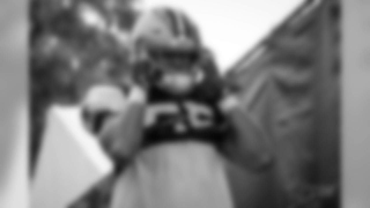 Views of the Dallas Cowboys as they take the field for the first time in pads for afternoon training camp practice at the River Ridge Complex in Oxnard, CA