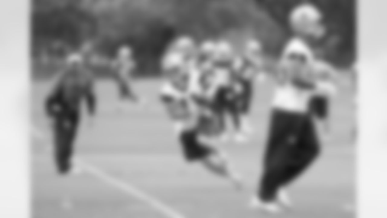 Cole Beasley runs with the ball during OTAs at Valley Ranch.