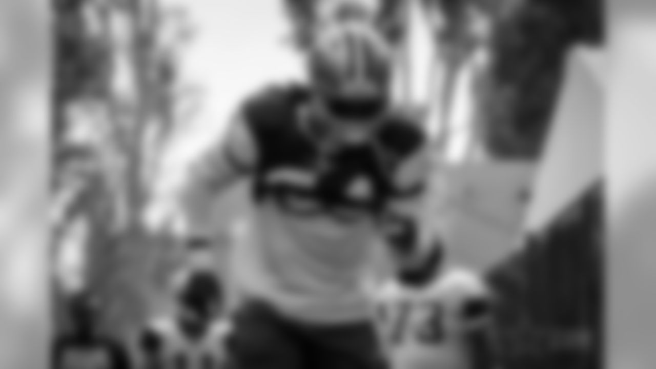 Views of the Dallas Cowboys as they take the field for the first time in pads for afternoon training camp practice at the River Ridge Complex in Oxnard, CA
