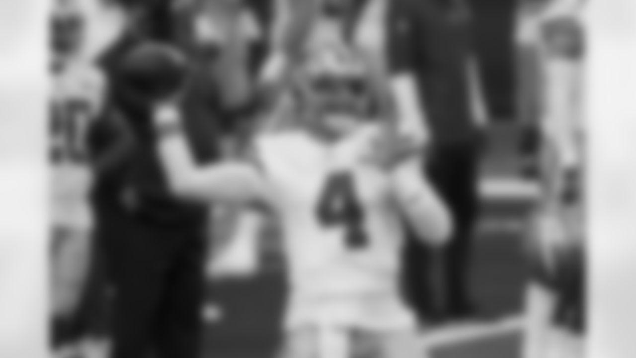 Dallas Cowboys quarterback Dak Prescott (4) throws a pass during warmups before an NFL football game against the New York Giants in Arlington, Texas, Sunday, Oct. 11, 2020. (AP Photo/Ron Jenkins)