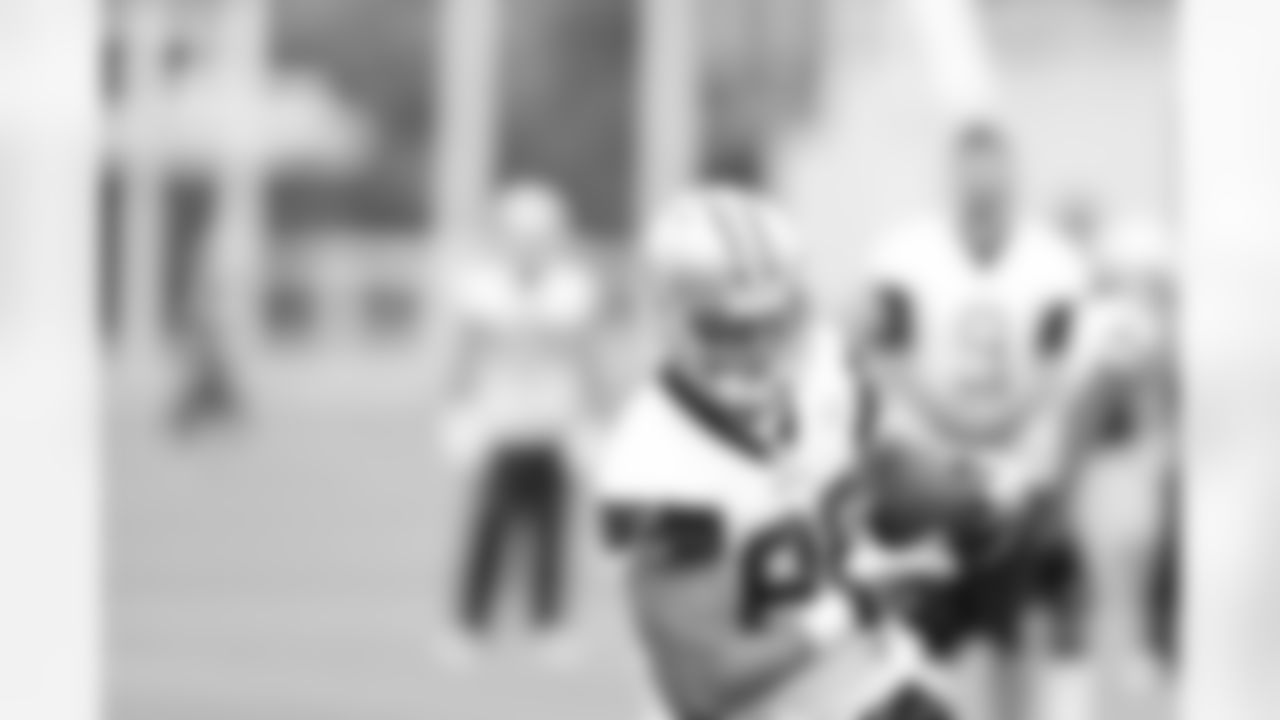 2nd round pick TE Gavin Escobar runs with the ball during OTAs.