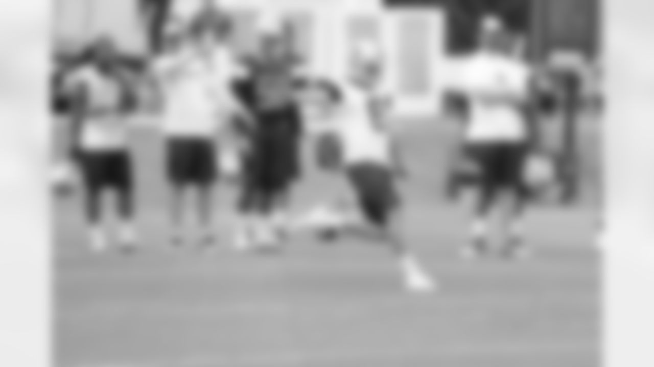 Chris Jones punts the ball during Tuesday's OTAs.