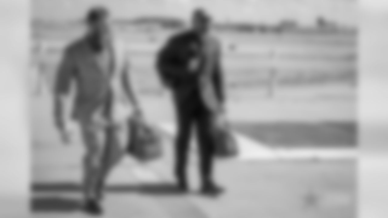 17 November 2018: Travis Frederick and Tyron Smith
of the Dallas Cowboys during their departure from DFW Airport to their game with the Atlanta Falcons at Mercedes-Benz Stadium in Atlanta, Georgia. Photo by James D. Smith/Dallas Cowboys