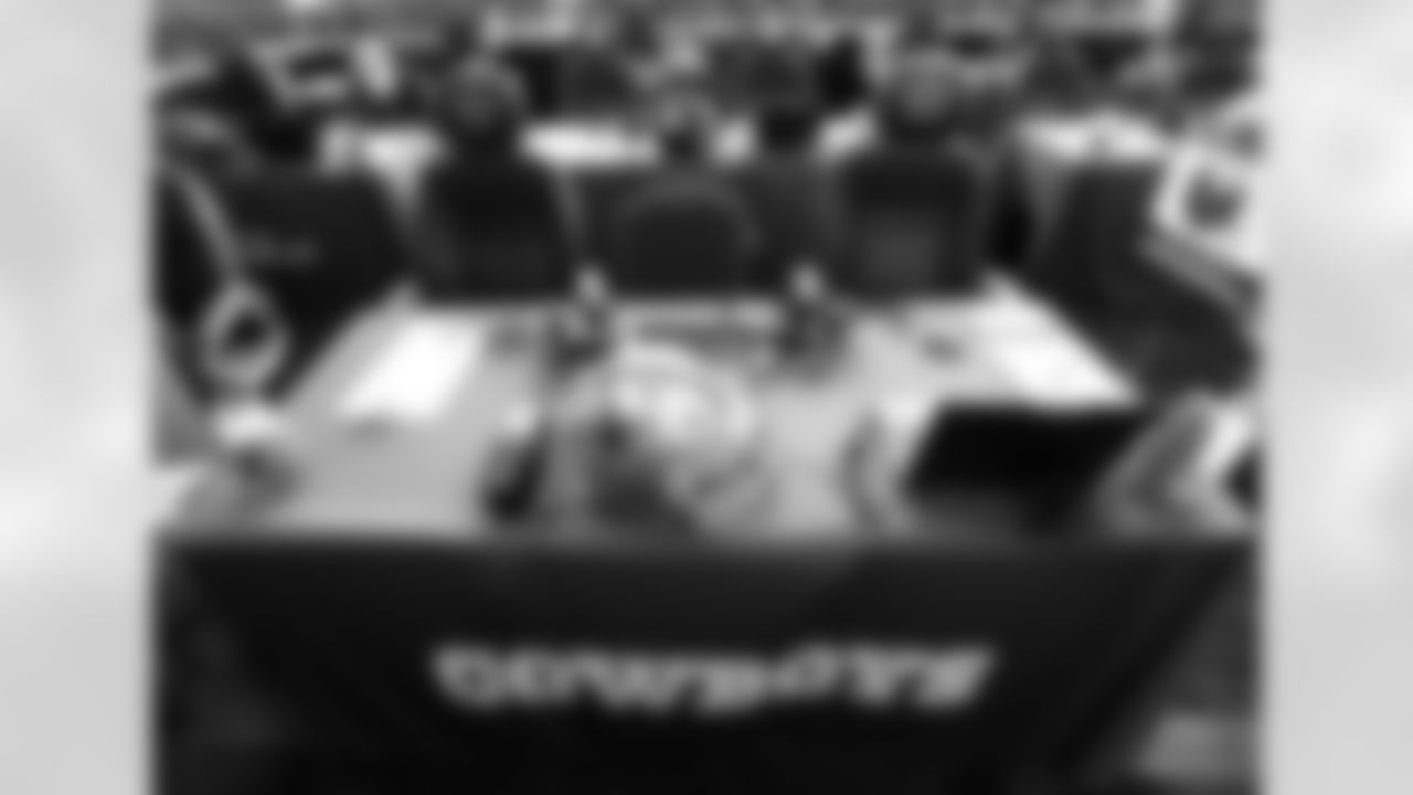The Dallas Cowboys team table is seen during the 2015 NFL Draft at Grant Park on Friday, May 1, 2015 in Chicago, Ill. (Perry Knotts via AP)