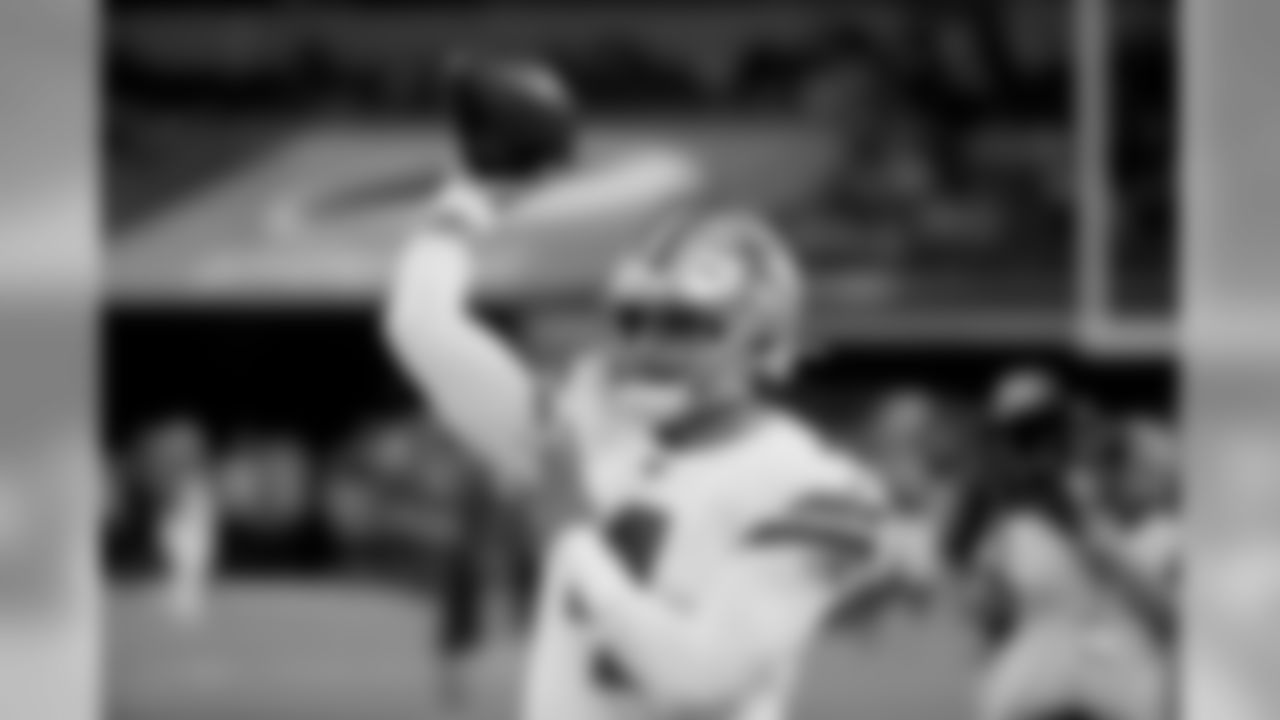 Dallas Cowboys quarterback Dak Prescott (4) throws a pass during warmups before an NFL football game against the Philadelphia Eagles in Arlington, Texas, Oct. 20, 2019. (AP Photo/Ron Jenkins)