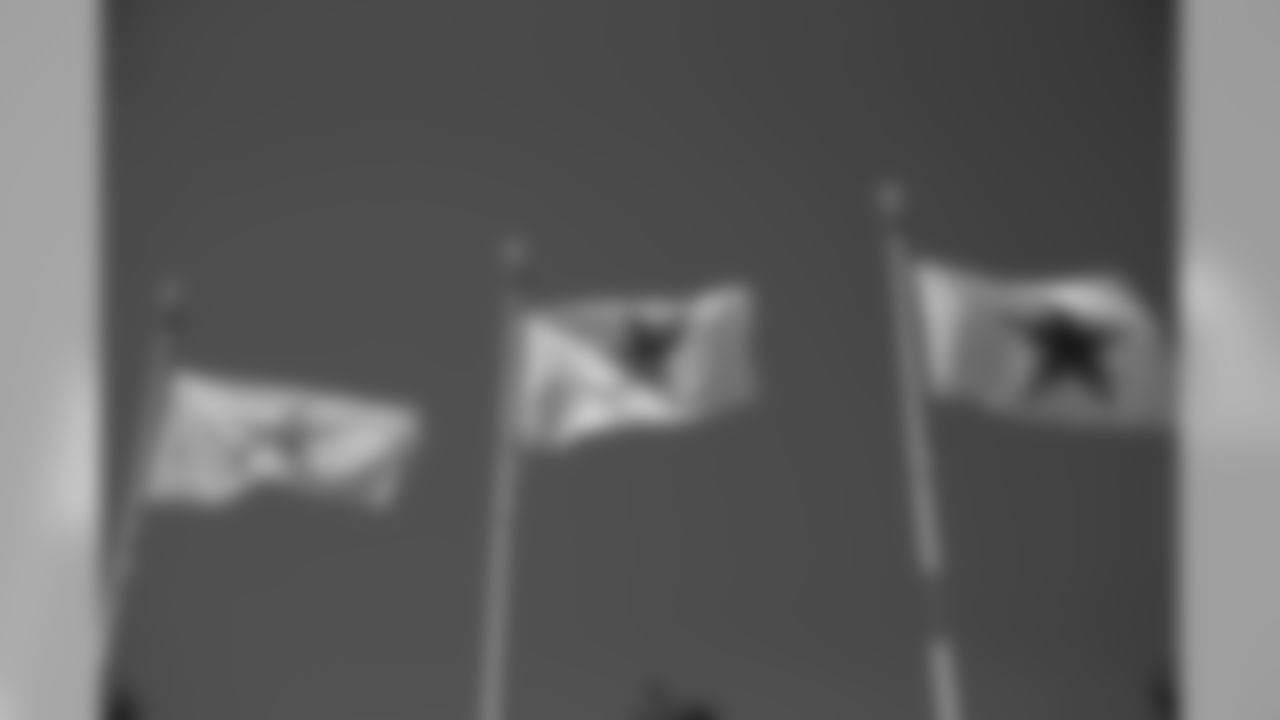 Dallas Cowboys flags fly by the stadium before a NFL football game against the New York Giants in Arlington, Texas, Sunday, Sept. 8, 2019. (AP Photo/Ron Jenkins)
