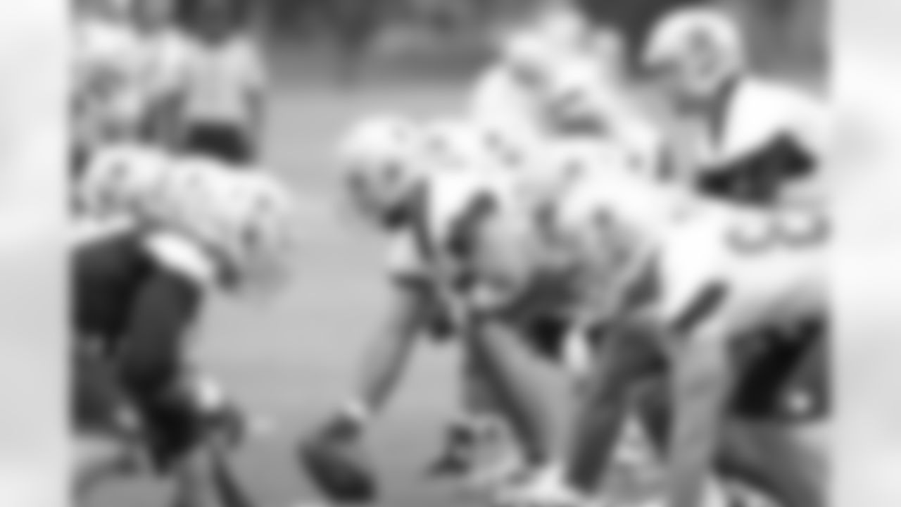 First round pick Travis Frederick lines up at center during OTAs.