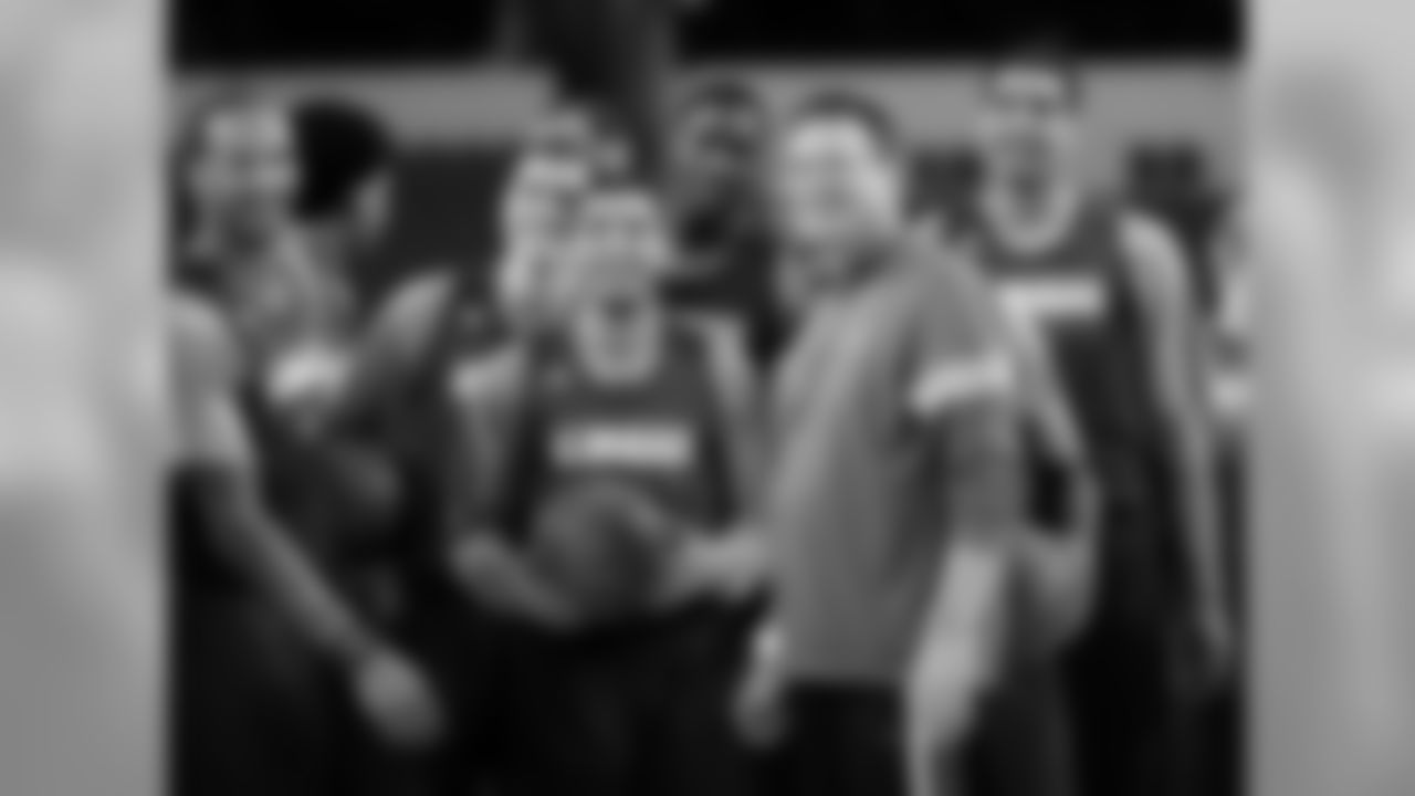 Coach Bill Self and his team have a little fun in front of the fans at Cowboys Stadium.