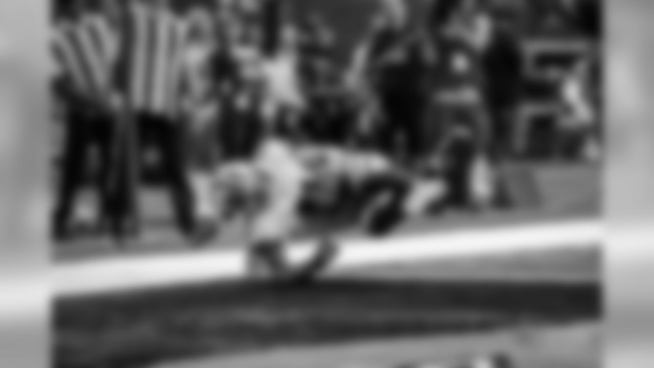Dallas Cowboys wide receiver Cole Beasley (11) scores a touchdown during an NFL football game against the Green Bay Packers, Sunday, Oct. 8, 2017, in Arlington, Texas. The Packers defeated the Cowboys, 35-31. (Ryan Kang via AP)
