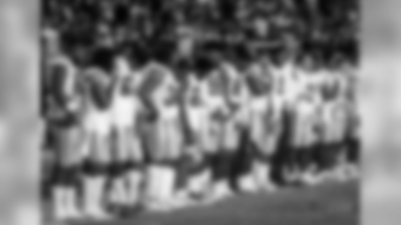 Dallas Cowboys players stand during the national anthem before the team's NFL preseason football game against the San Francisco 49ers in Santa Clara, Calif., Thursday, Aug. 9, 2018. (AP Photo/Tony Avelar)