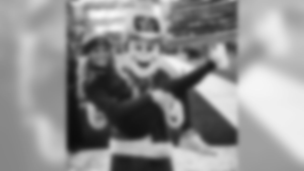 rowdy_photo_-_rowdy_claus_with_promo_girl_2014_0.jpg