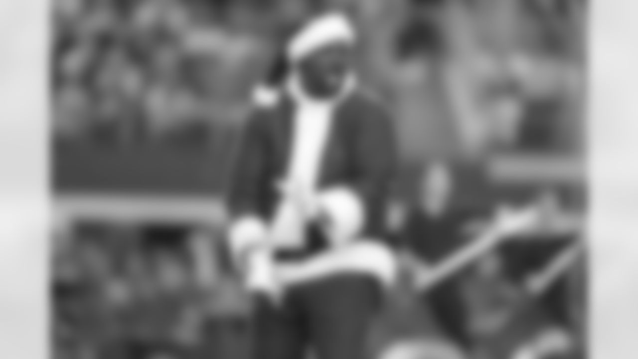 21 December 2014: Santas during cheerleaders Christmas halftime show
of the Dallas Cowboys during the Cowboys 42-7 win over the Indianapolis Colts at AT&T Stadium in Arlington, Texas. Photo by James D. Smith/Dallas Cowboys