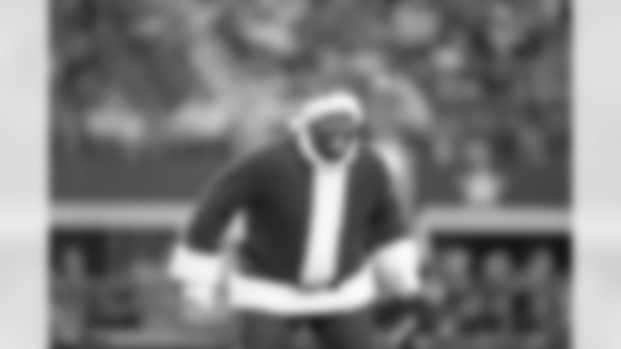 21 December 2014: Santas during cheerleaders Christmas halftime show
of the Dallas Cowboys during the Cowboys 42-7 win over the Indianapolis Colts at AT&T Stadium in Arlington, Texas. Photo by James D. Smith/Dallas Cowboys
