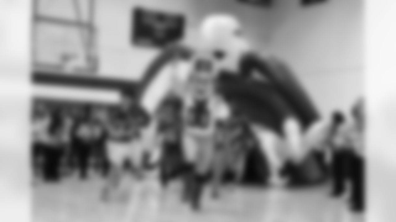 rowdy_photo_-_coach_of_the_week_-_running_out_with_eagles_hs_football_team_0.jpg