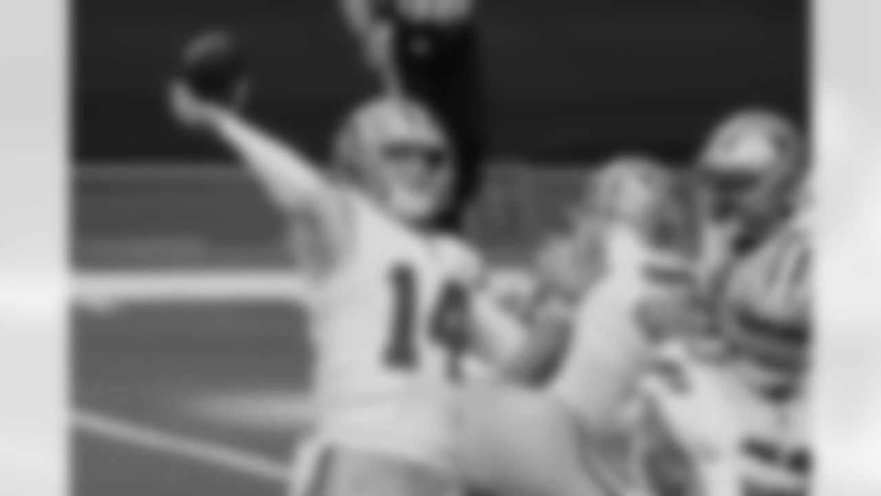 Dallas Cowboys quarterback Andy Dalton (14) throws a pass as he warms up before an NFL football game against the San Francisco 49ers in Arlington, Texas, Sunday, Dec. 20, 2020. (AP Photo/Michael Ainsworth)