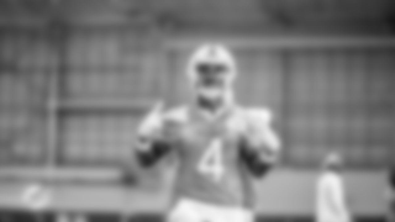 Miami Dolphins cornerback Kader Kohou (4) gives the peace sign during OTA's at the Baptist Health Training complex on Monday, May 22nd, 2023 in Miami Gardens, Fla. (Brennan Asplen/Miami Dolphins)