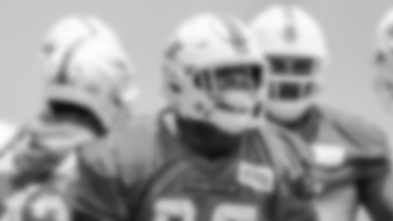 Miami Dolphins defensive tackle Jaylen Twyman (97) celebrates during OTA's at the Baptist Health Training complex on Tuesday, May 23rd, 2023 in Miami Gardens, Fla. (Brennan Asplen/Miami Dolphins)