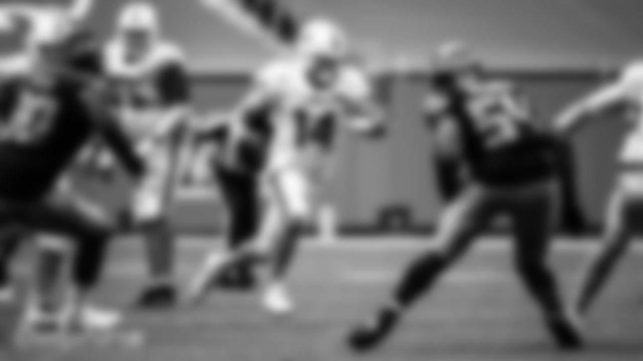 Quarterback Ryan Fitzpatrick (14) runs the ball during a Week 4 NFL football game against the Seattle Seahawks on Sunday, October 4th, 2020 at Hard Rock Stadium in Miami Gardens, FL. (Miami Dolphins)