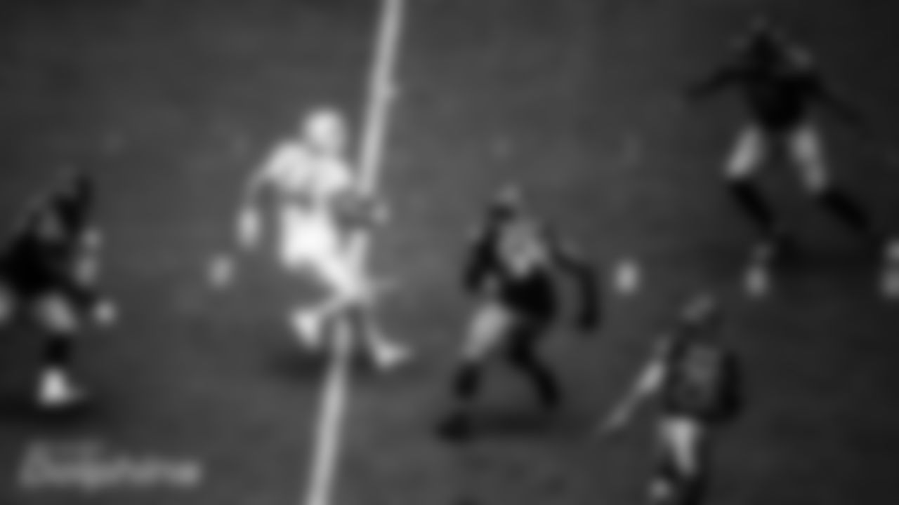 Quarterback Ryan Fitzpatrick (14) runs the ball during a Week 4 NFL football game against the Seattle Seahawks on Sunday, October 4th, 2020 at Hard Rock Stadium in Miami Gardens, FL. (Miami Dolphins)