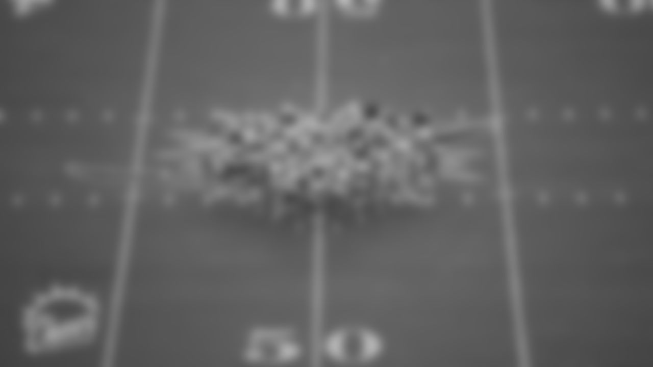Cheer performs their pregame routine at midfield before an NFL preseason football game against the Atlanta Falcons, Saturday, Aug. 21, 2021, in Miami Gardens, Fla. (Mary Holt/Miami Dolphins)