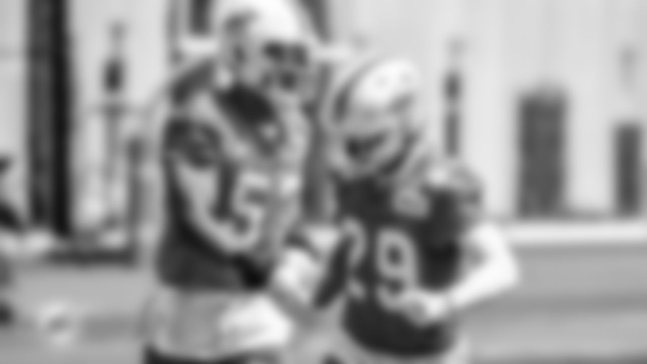 Miami Dolphins linebacker Brennan Scarlett (57) and safety Brandon Jones (29) during minicamp Thursday, June 2nd, 2022 in Miami Gardens, Fla. (Peter McMahon/Miami Dolphins via AP)