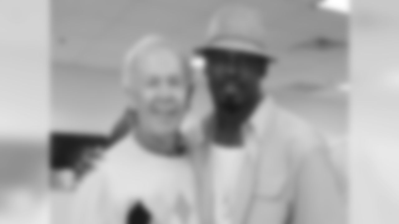 Leo Carlin with Brian Dawkins after it was announced that Dawkins' No. 20 will be retired by the team